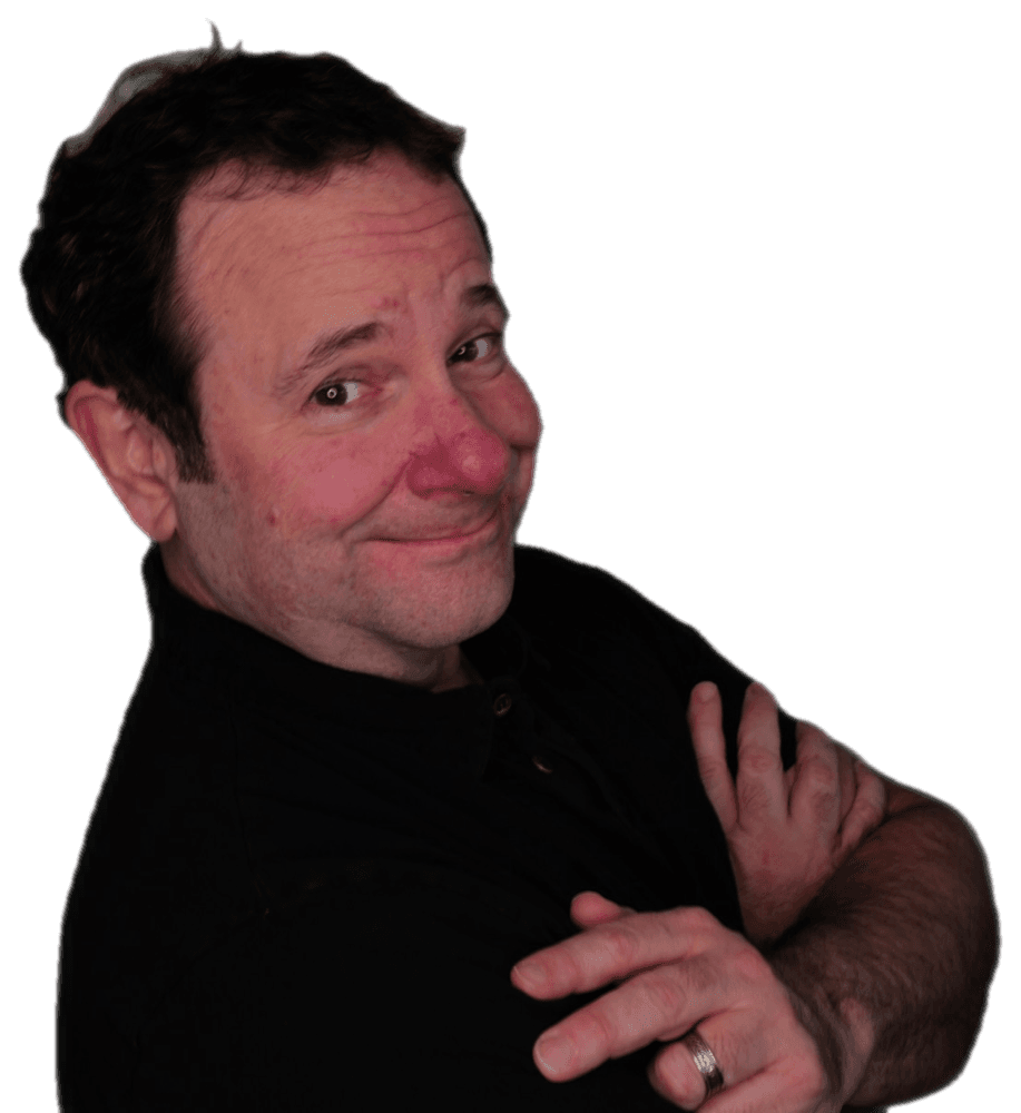 Roland Frasier, arms crossed, smiling